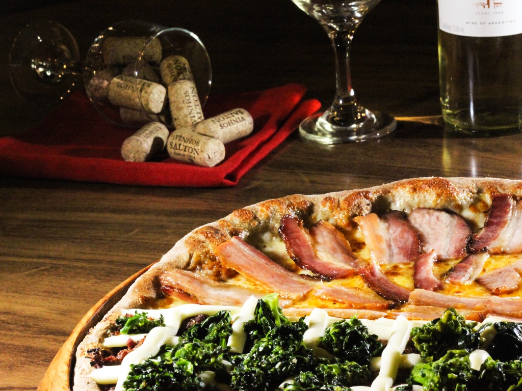 Quais são as diferenças de consumir pratos e pizzas da Margherita?